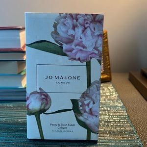 red apple and the opulence of jasmine, rose and gillyflower.